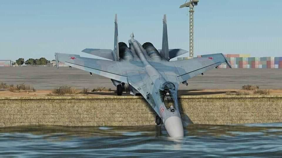 Beautiful and unpublished photograph of a MIG-29 drinking water from a river
