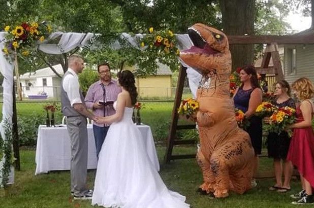 Maid of honor wears T-Rex costume after being told she could wear ‘anything’