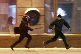 Me running away from Area 51 with Downudder's cat reaction folder