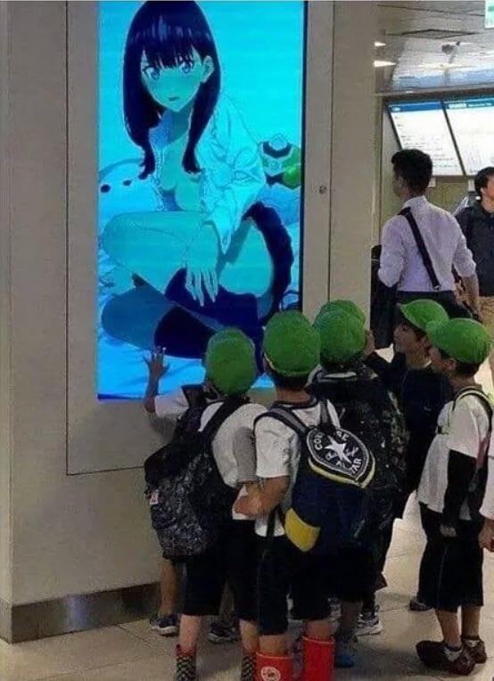 jewish machine luring innocent kids into being weebs [ca. 2019, colourised]