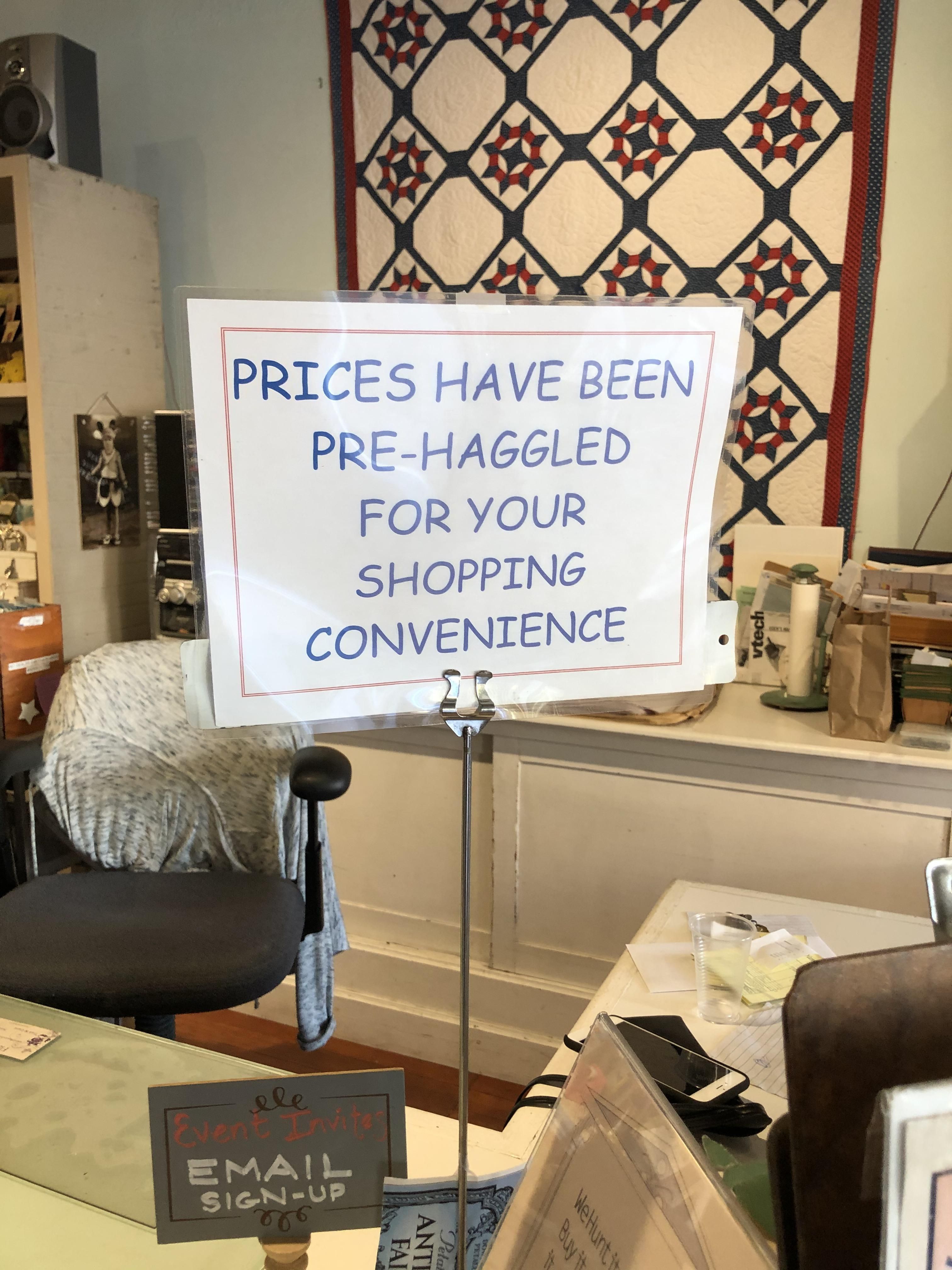 This sign in an antique store.