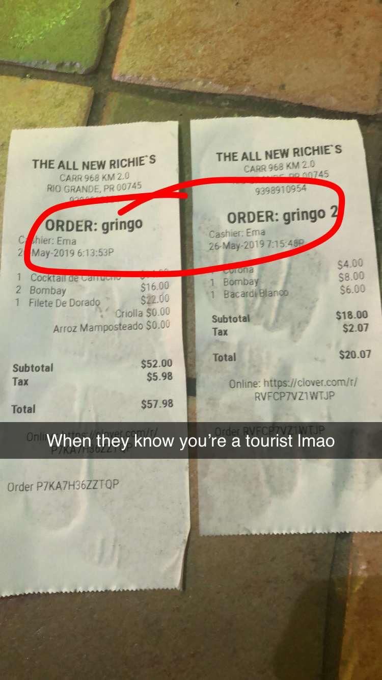 This is my buddy and my receipts from a restaurant in Puerto Rico. I love this island