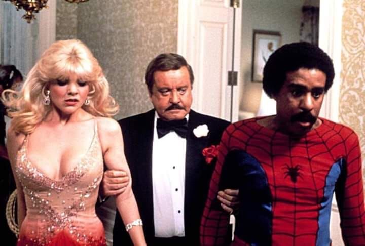 Miles Morales and Gwen Stacy being escorted from a kingpin party colorized