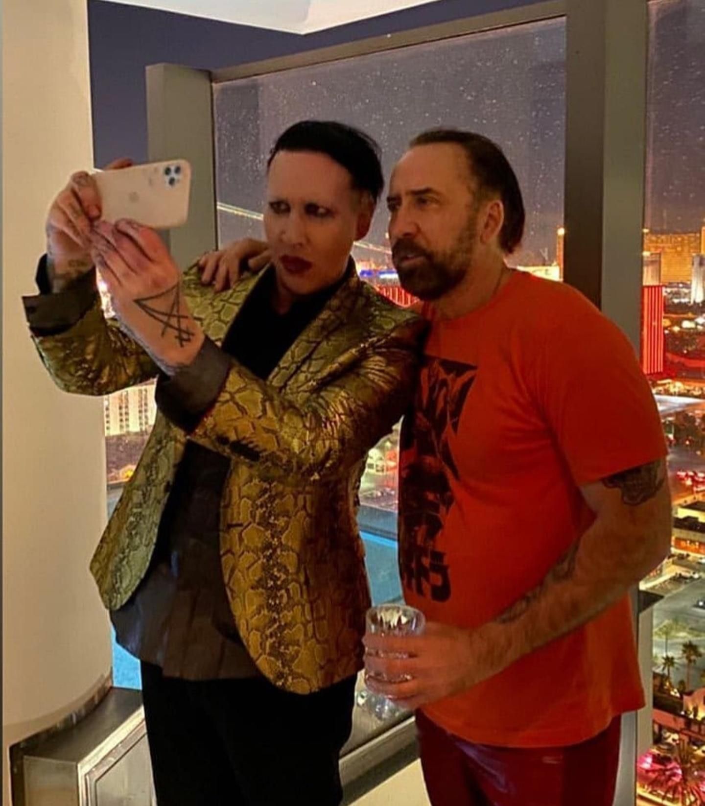 The crossover we've all been waiting for. Proof that Marilyn Manson and Nicholas Cage are Not the same person