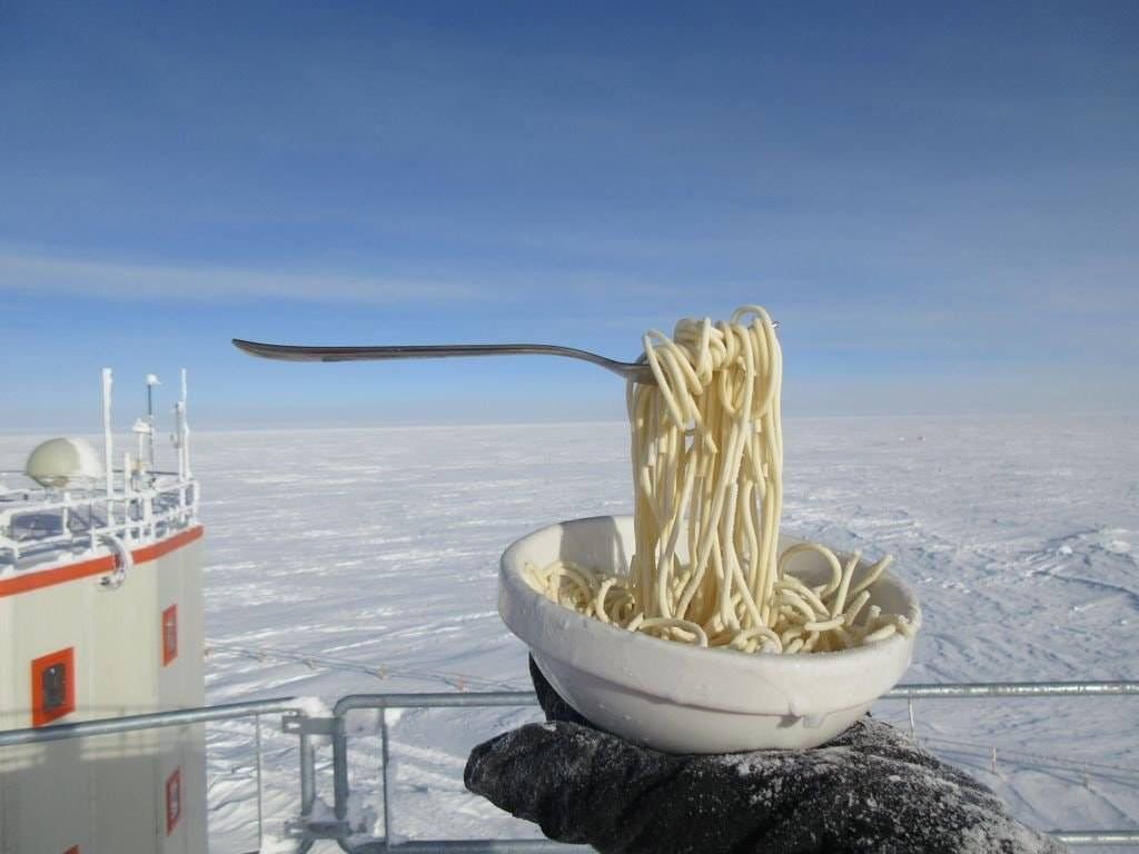 Trying to eat noodles in Antarctica