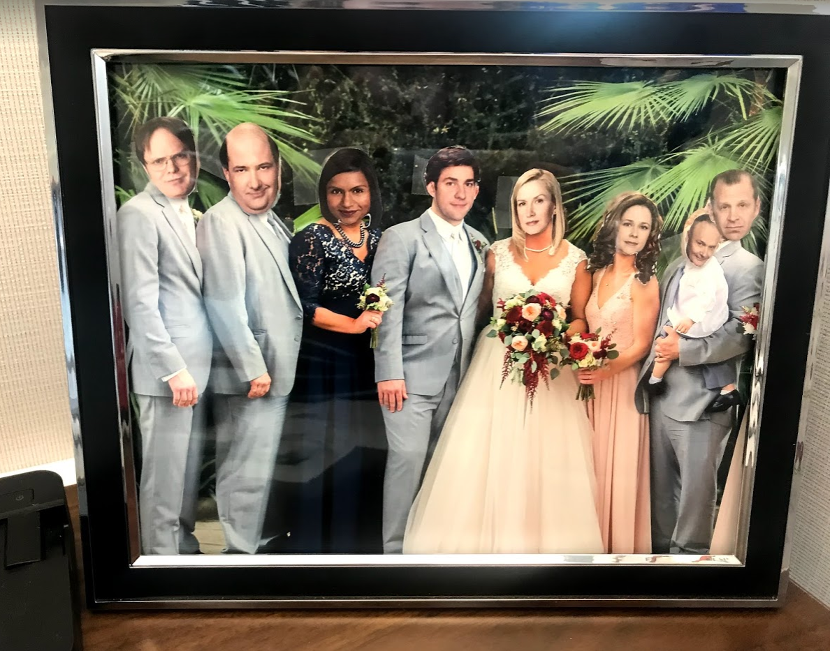 Coworker has a picture of his sister's wedding on his desk. We did this to it.