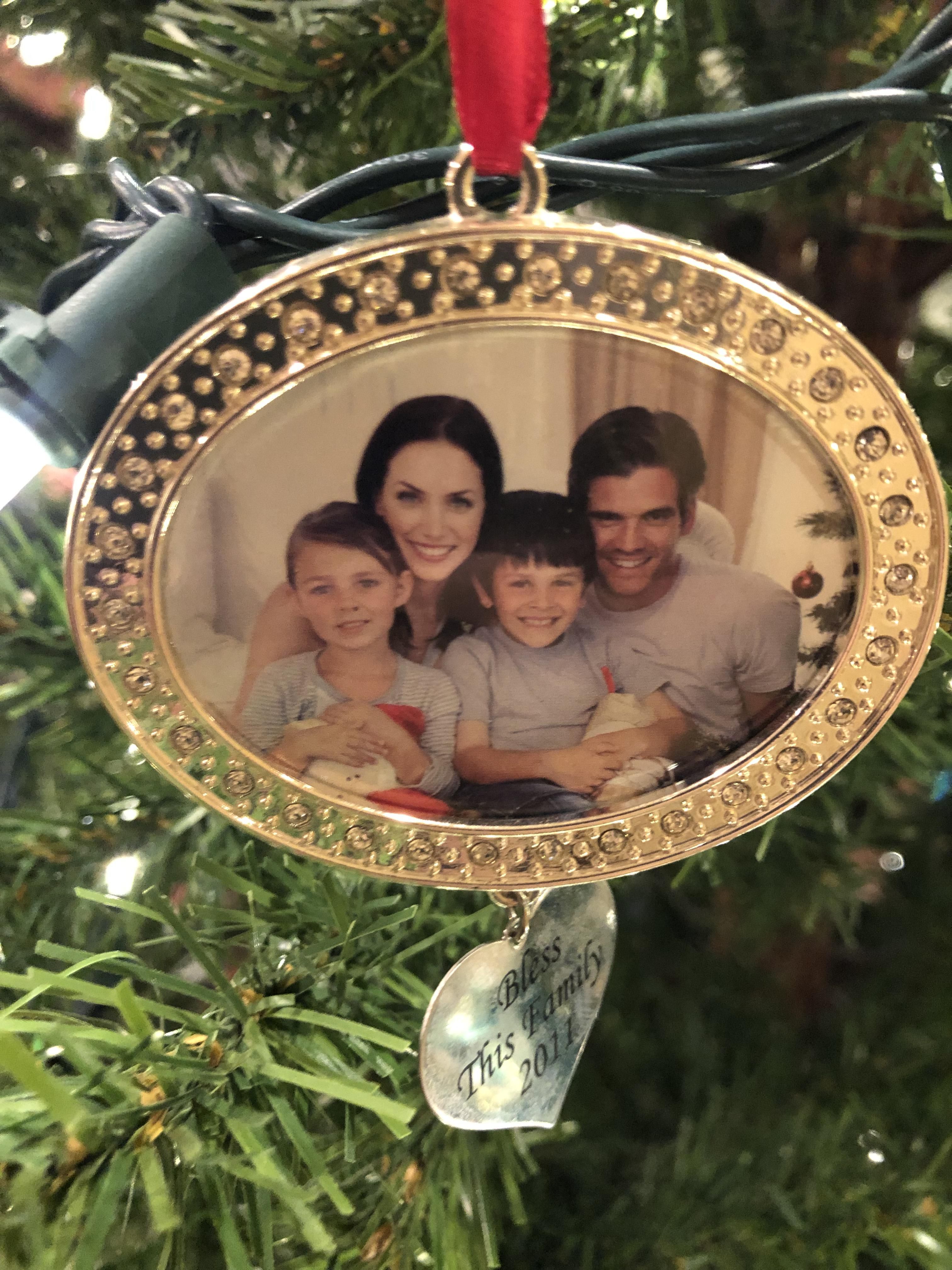 We bought this eight years ago and never replaced the picture. My sons calls it our alternate reality family Christmas pic.