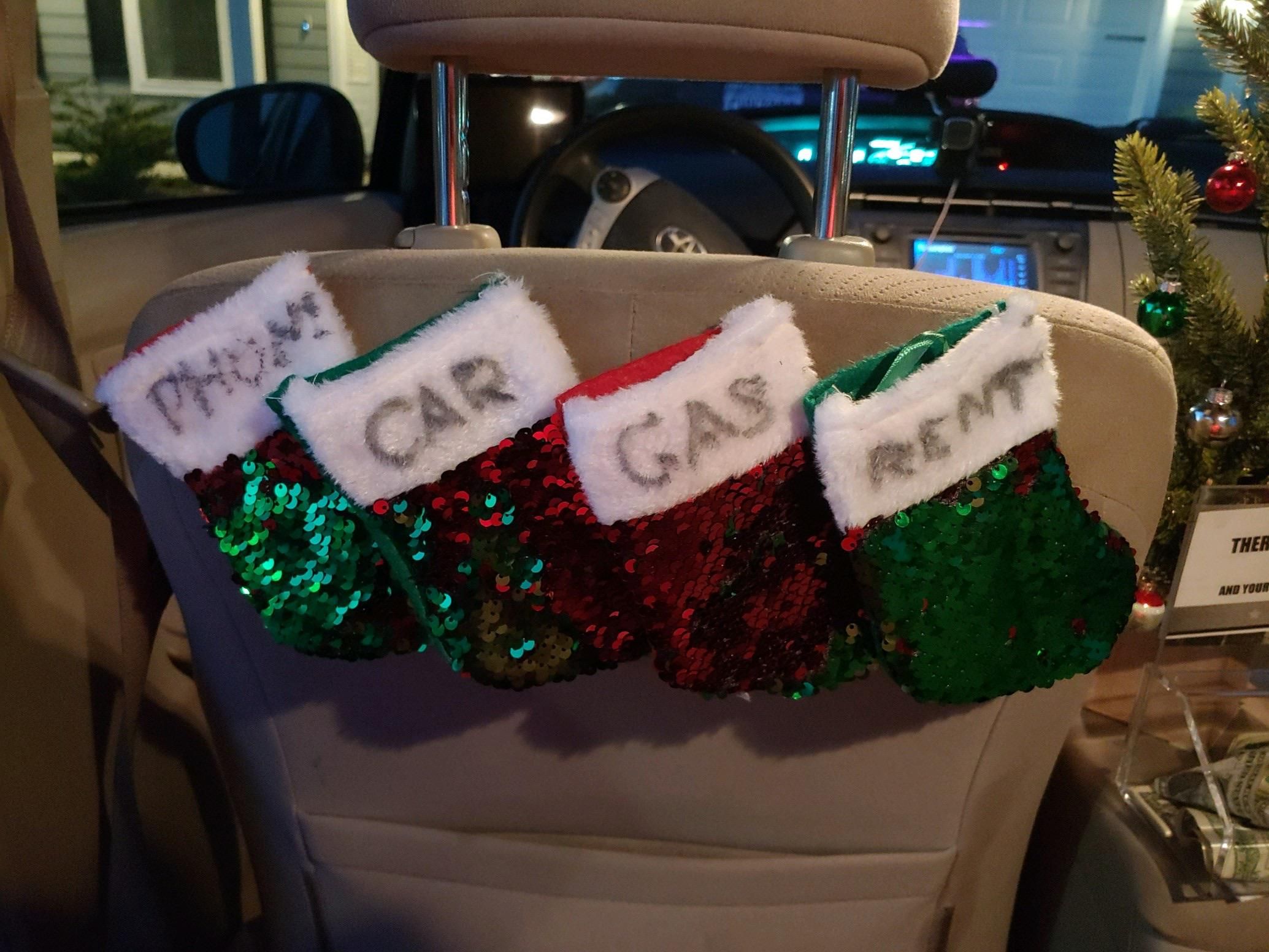 In the back of my Lyft drivers car. Merry Christmas!
