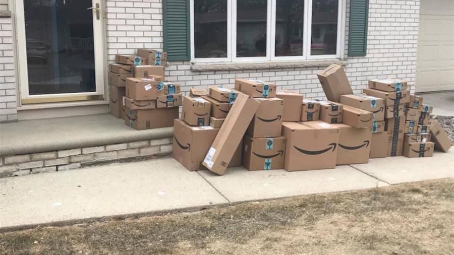 Save all your amazon boxes over the coming year and next Christmas put all of them outside at once one day while your husband is at work...