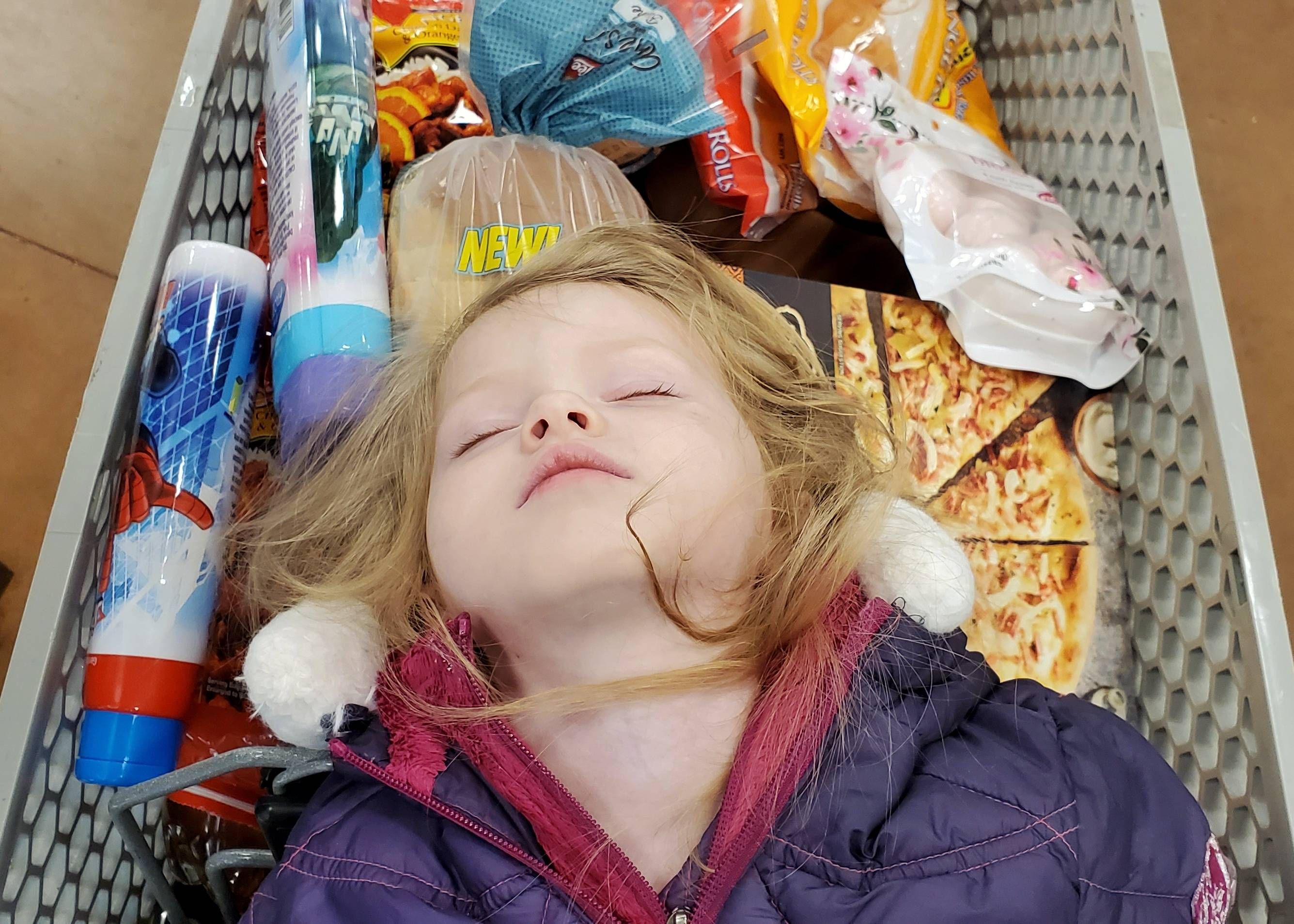 My daughter fell asleep in the cart at the grocery store last night and she totally looked like a fallen viking warrior being sent out to sea.