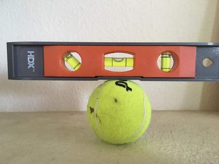 Tennis companies are lying! Tennis balls are flat!