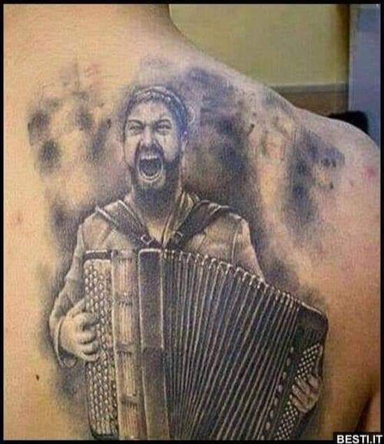 At the tattoo parlor: "I like 300 and folklore music." The tattoo artist: "Say no more."