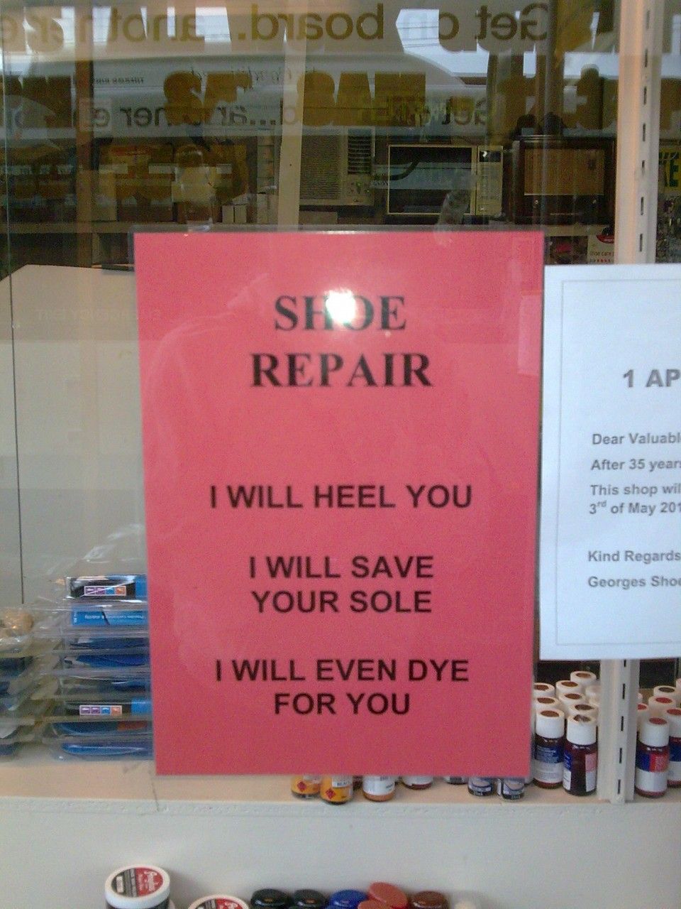 This shoe repair shop sign