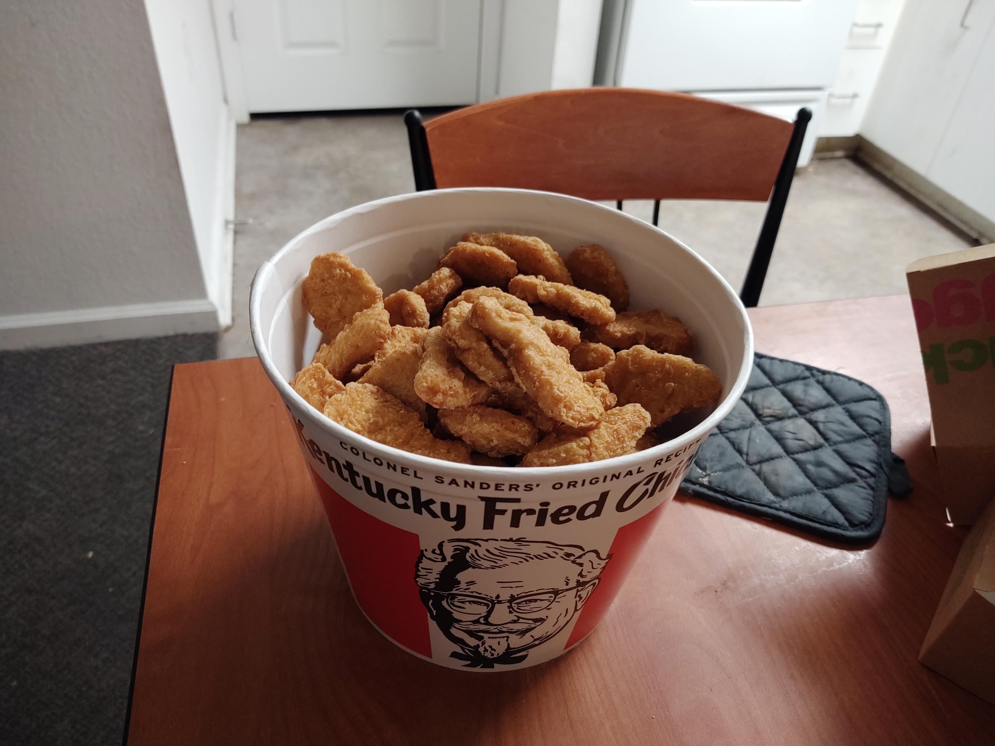 So my boyfriend's dream of filling a bucket with 100 McDonald's chicken nuggets has been fulfilled