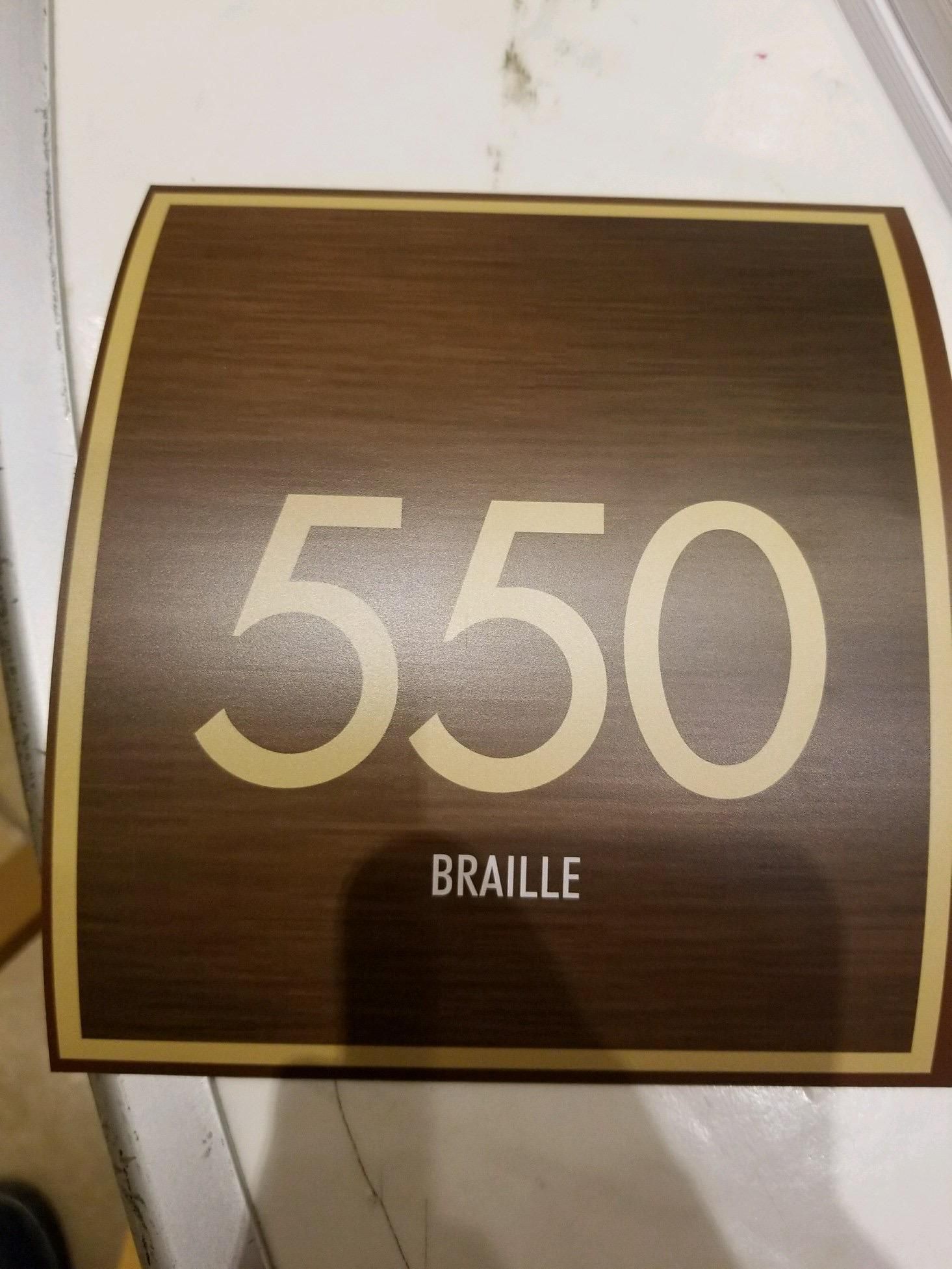 My friend works for a contracting company that is renovating a hotel. They asked for room numbers, with braille on the bottom for blind people to read. This is what their supplier sent them .