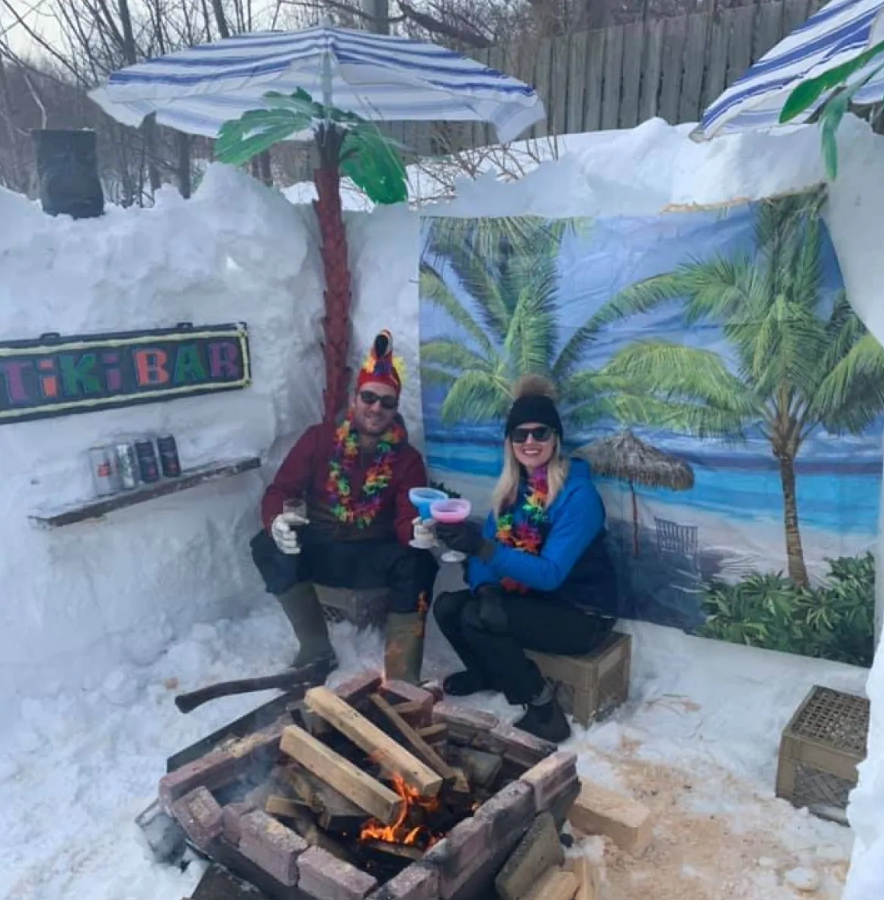 Day 5 of state of emergency: 5 o'clock somewhere....tiki snow fort time! Just have to dig the firepit out...