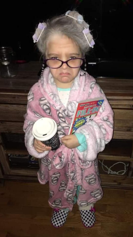 My friend's daughter for her 100th day of school, went as a "100 year old lady".