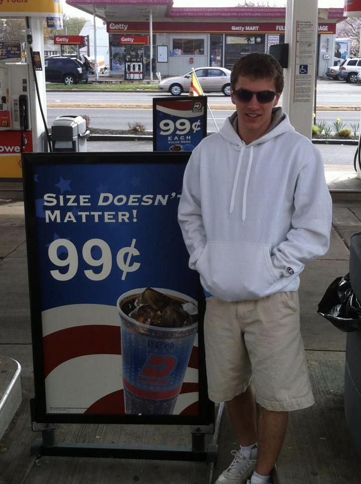 We told our 5'4" friend who was pumping gas to quickly turn around for a picture. He didn't see the sign.