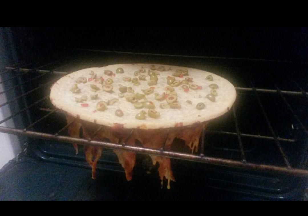 Baked my pizza upside down after putting olives on the wrong side...don't smoke weed and cook