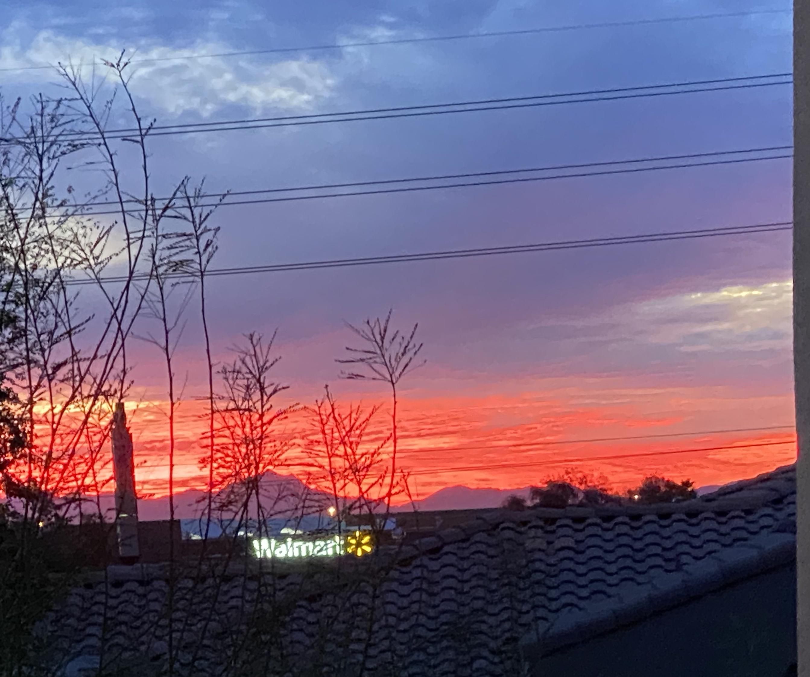 My girlfriend knew we moved into the right apartment when she saw the view of the Walmart at sunset.