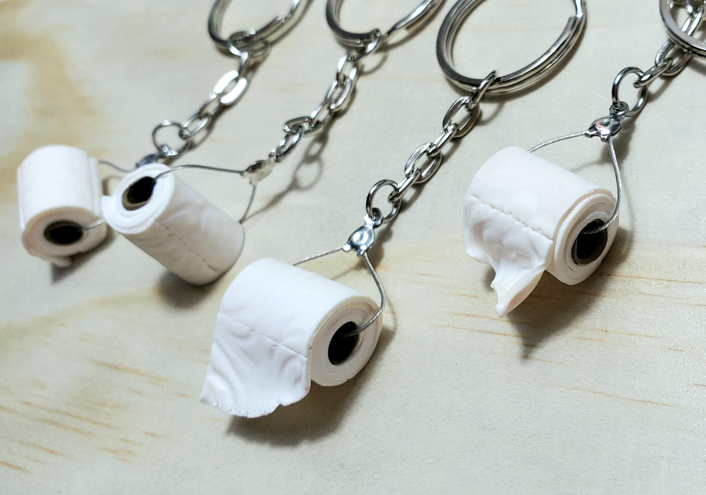 Etsy sent me an email saying that I violated their rules by being offensive. I made these keychains in light of Canada running out of toilet paper!