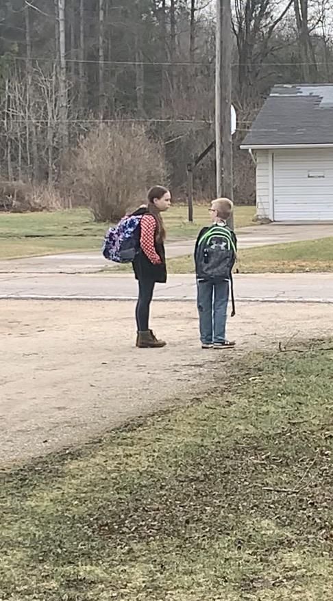 My kids waiting for the bus today. Happy April fools day!
