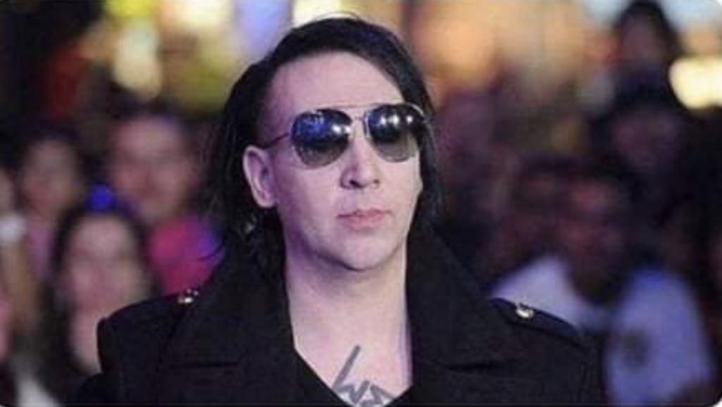 Marilyn Manson looks like Nicolas Cage disguised as Marilyn Manson