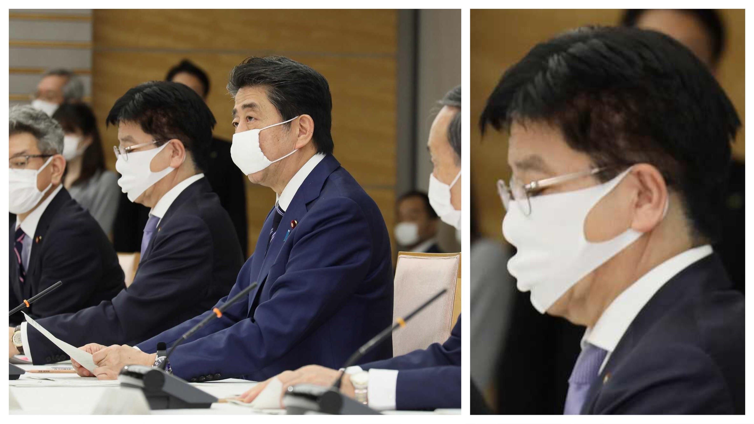 Japanese media keep focusing on PM Abe’s small mask, yet there’s this guy beside him.