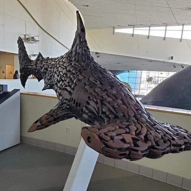 Hammerhead shark made out of hammer heads.