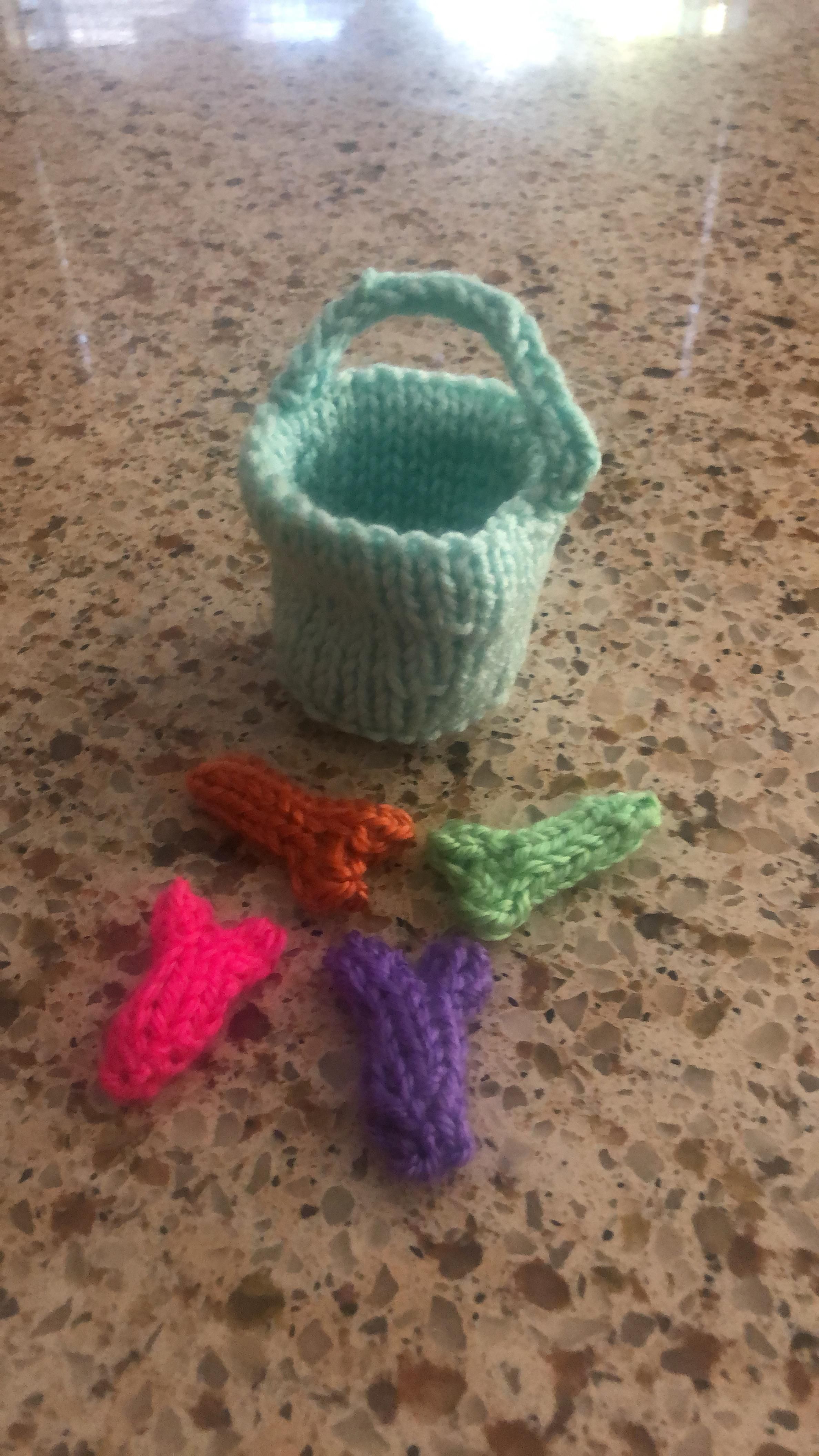 To cheer me up during stay-at-home my friend knitted me this little bucket of dicks.