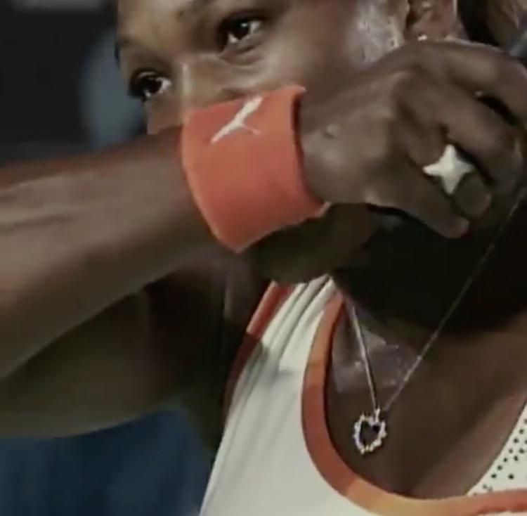 Serena Williams wearing a Puma sweatband in the new Nike ad