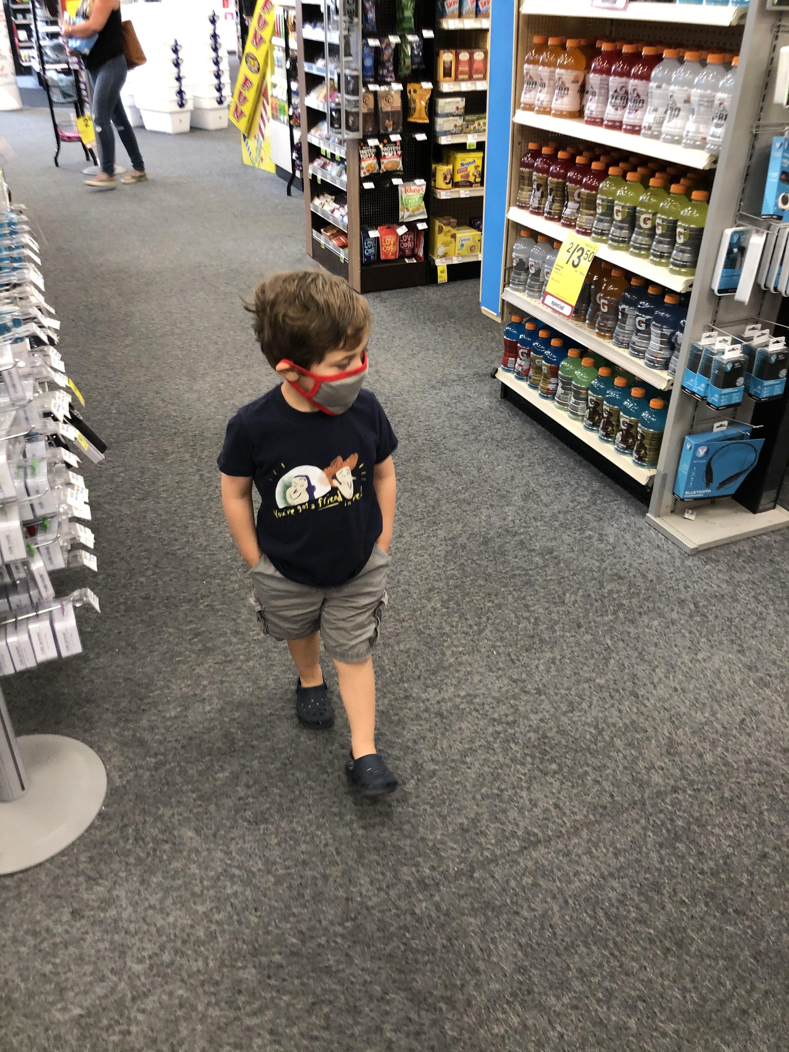 There’s something about my son walking the aisles in a mask with his hands in his pockets that makes it seem like he’s the regional manager checking it out.