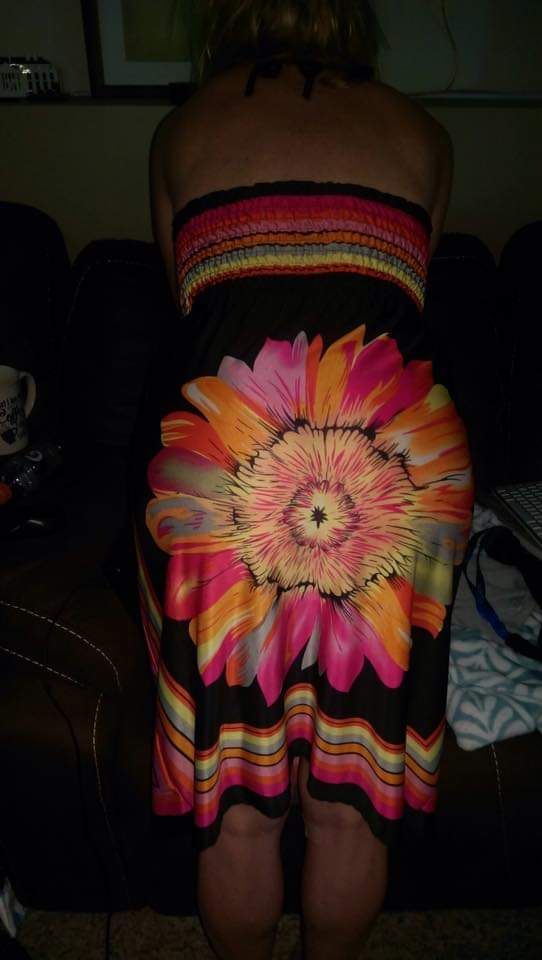 Check the placement of the flower before you buy the dress ladies.