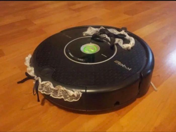 Roomba wearing a maid outfit