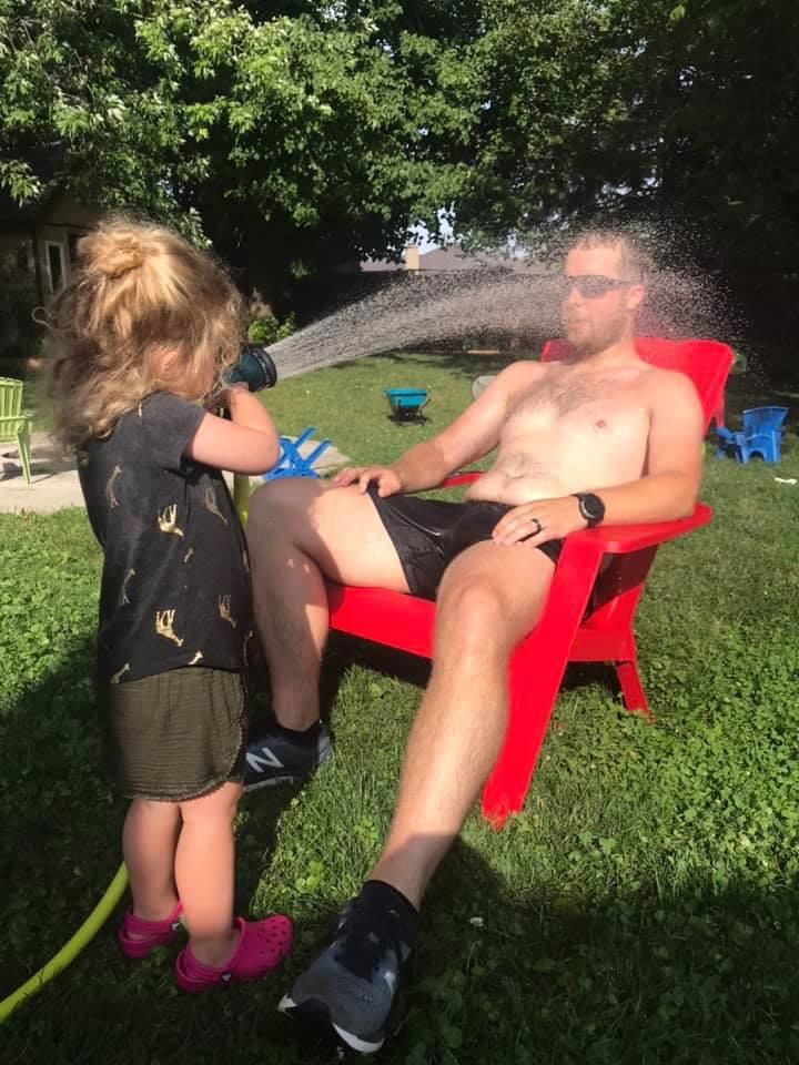 My daughter’s favourite way to cool me off after a long run on a hot day.