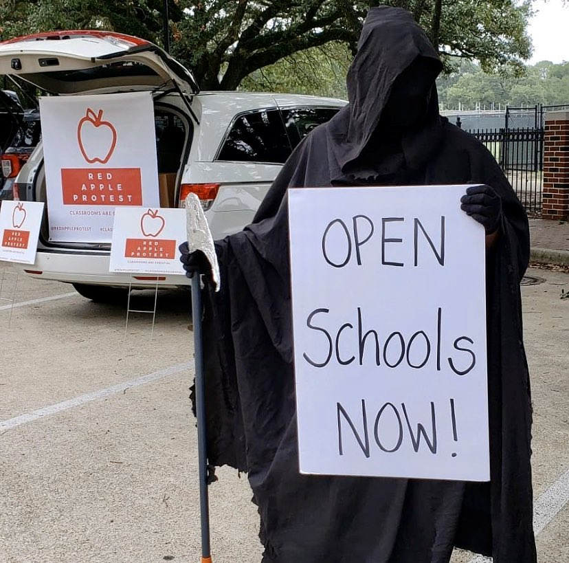 Grim Reaper protesting to open scools in Houston