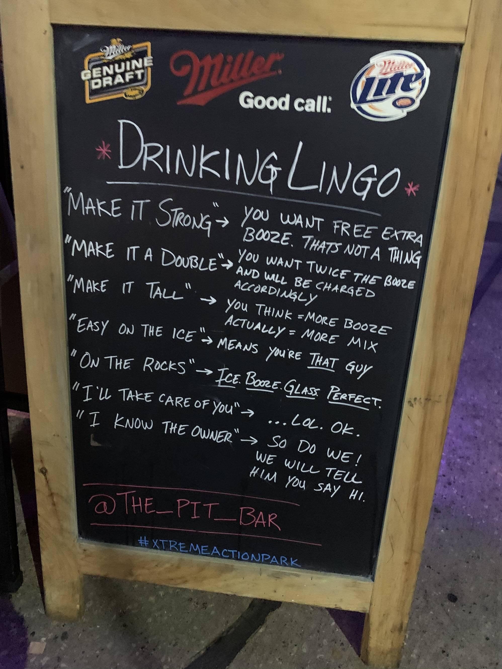 A sign at a bar.