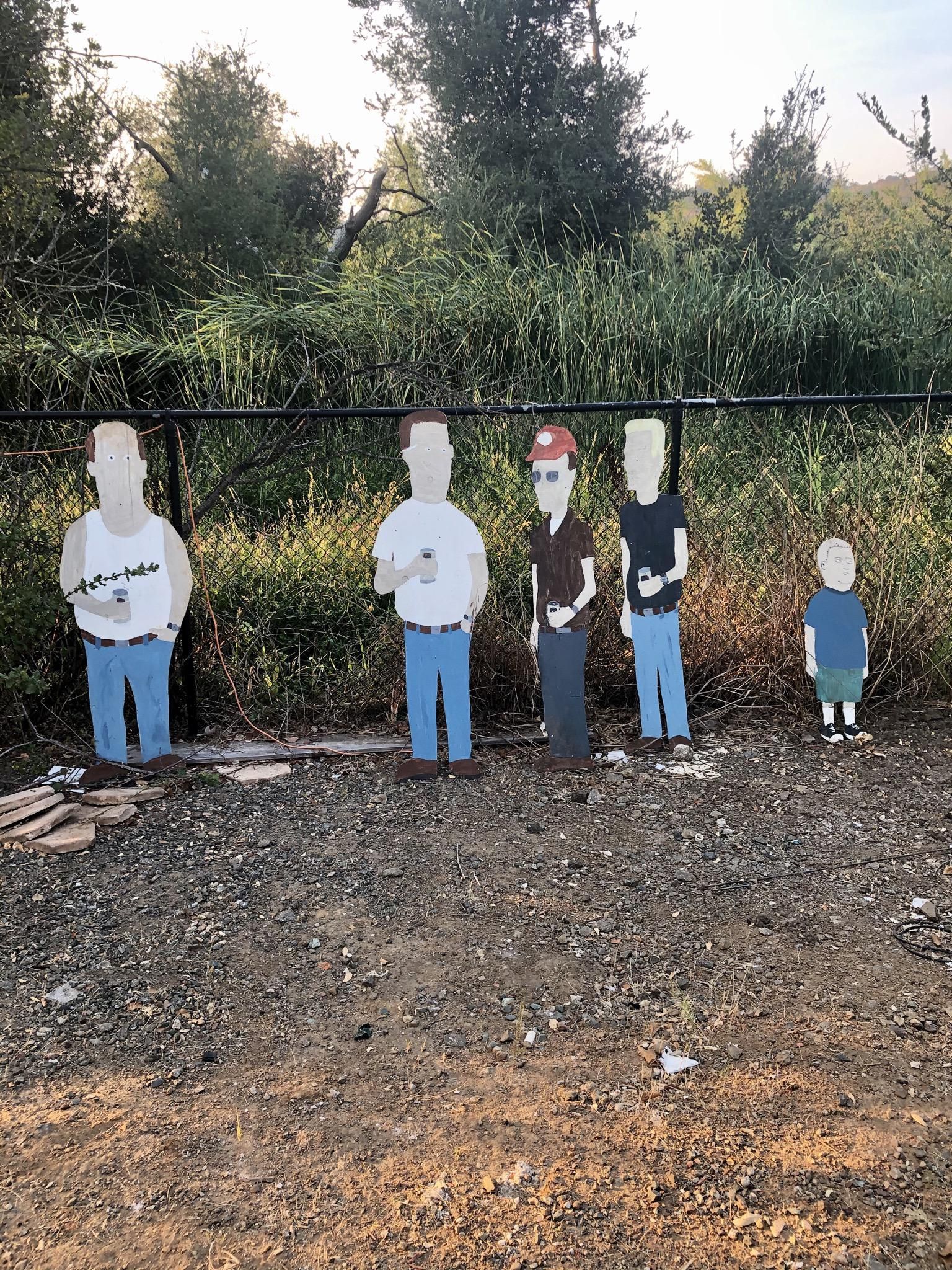 My dad is a huge King of the Hill fan. He made these and keeps them in his backyard.