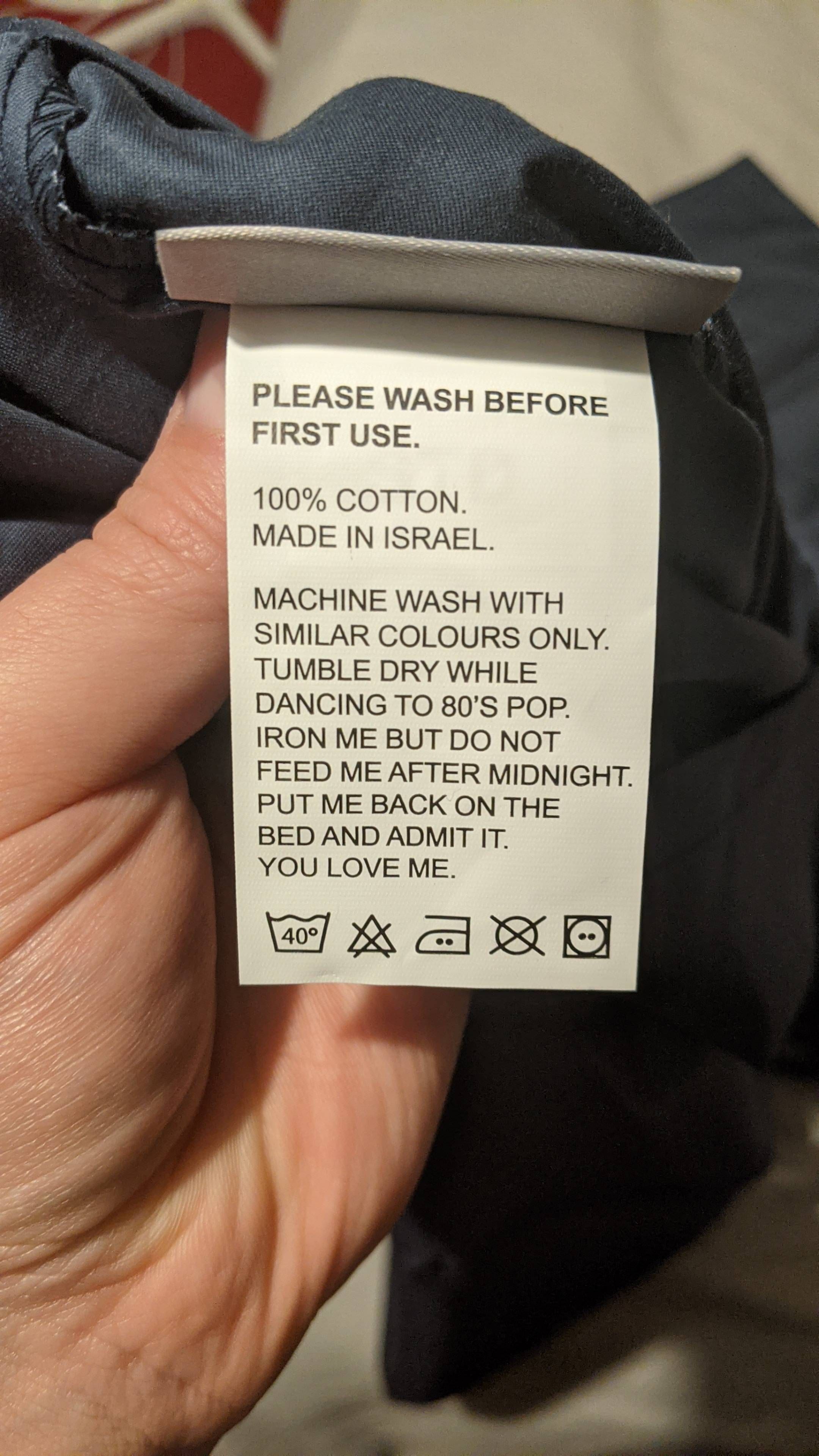 The label on my new fitted bed sheet. Slightly afraid of washing it if I shouldn't feed it after midnight.