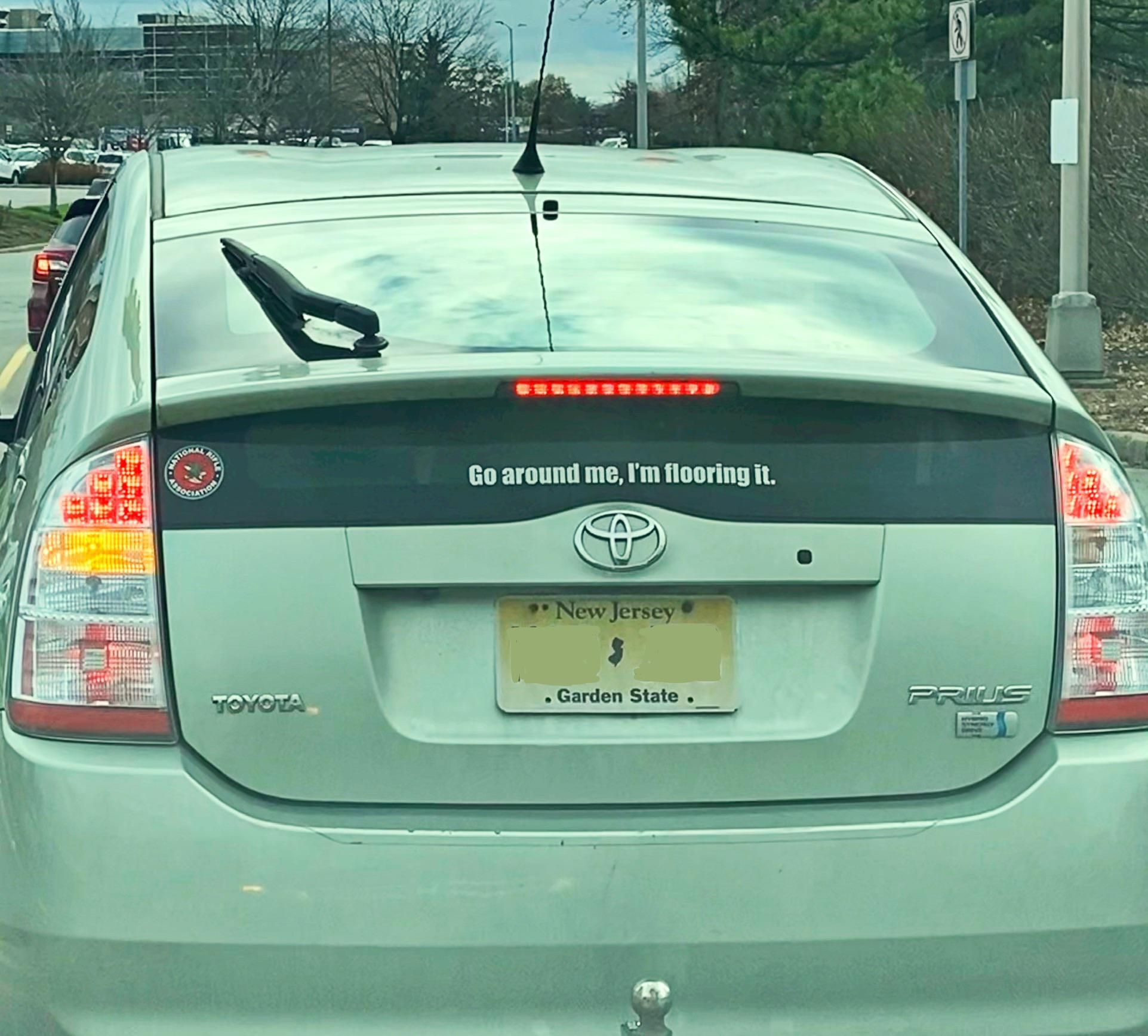 This bumper sticker on a Prius.