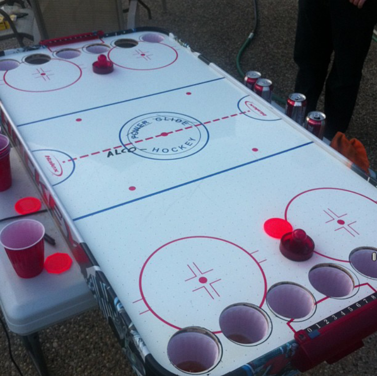 My cousin informs me Canada does not generally play 'Beer Pong'. They actually have their own regional sport, naturally called 'Alcohockey'.