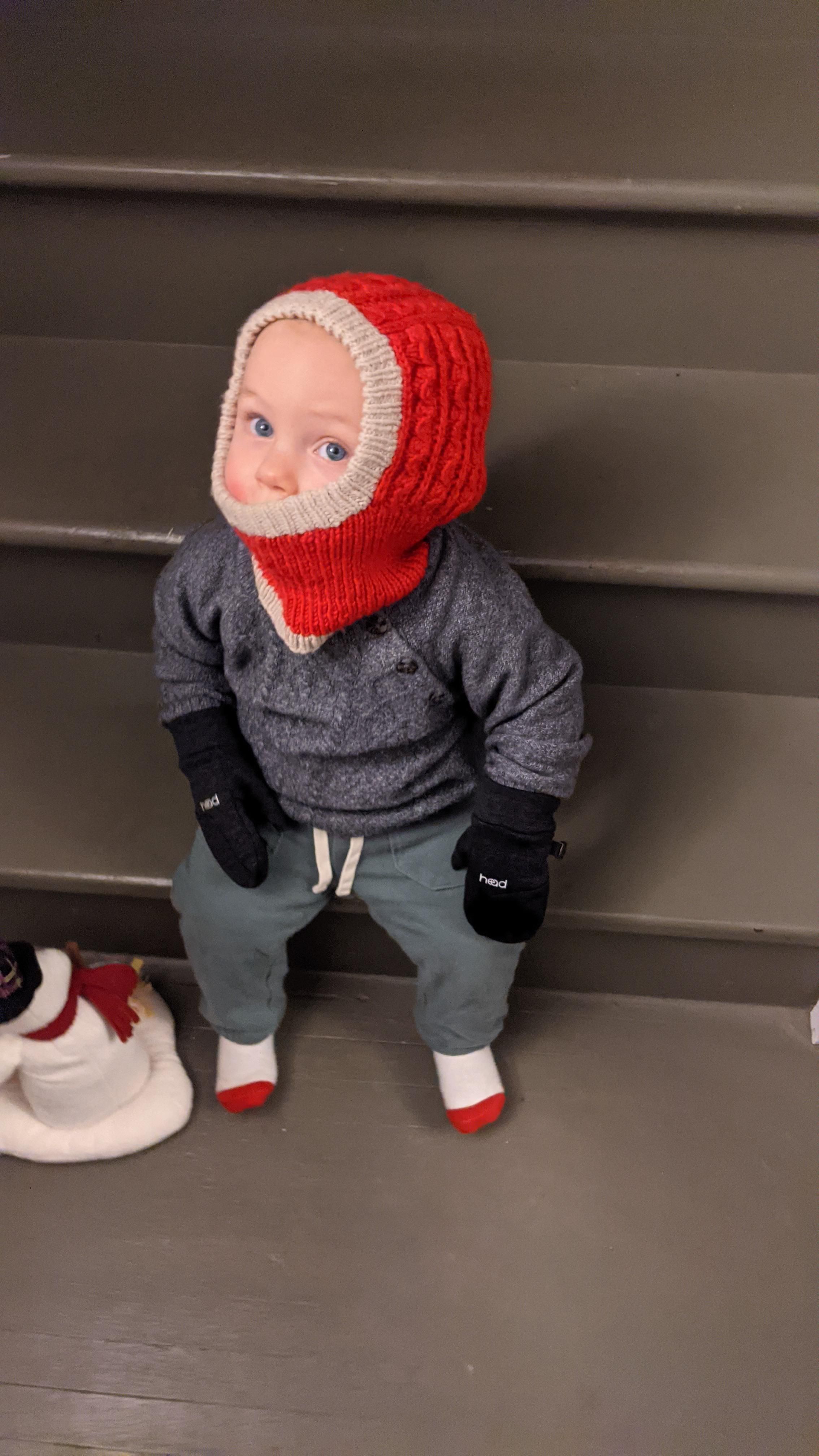 Getting my nephew ready to go out in the snow.