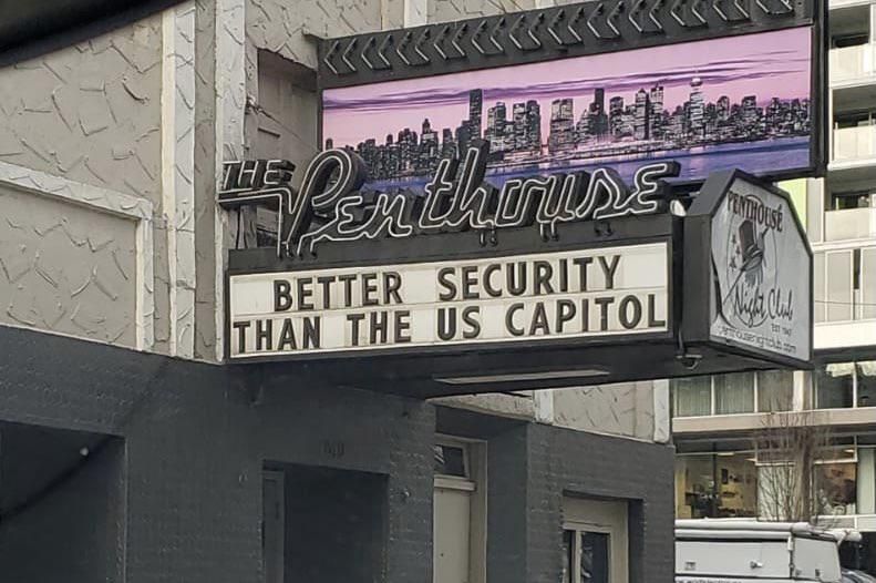 Strip club in Vancouver sign following the Storming of the US Capital