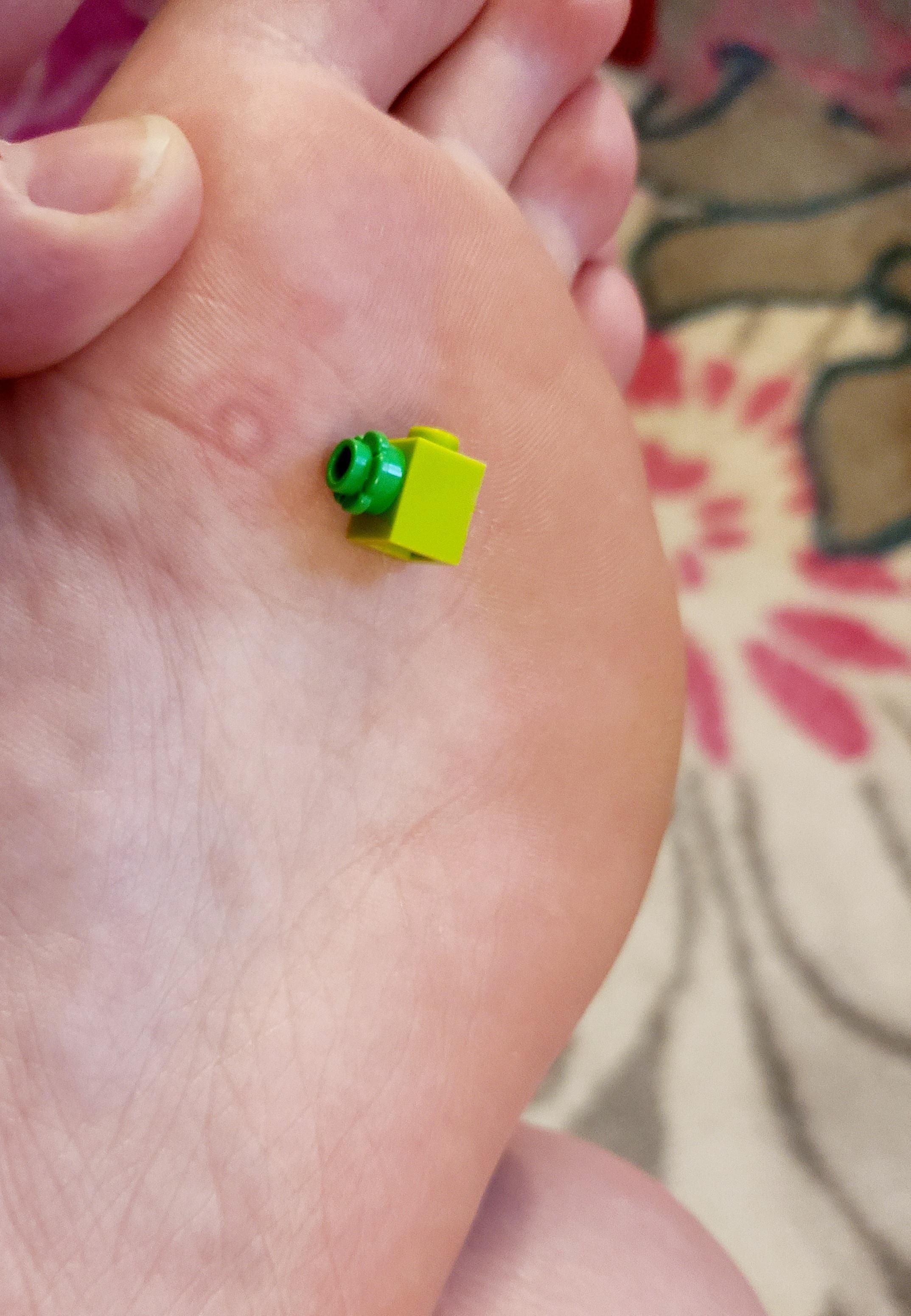 A mom for 4 years, and I am a parent officially today. I stepped on my first Lego!
