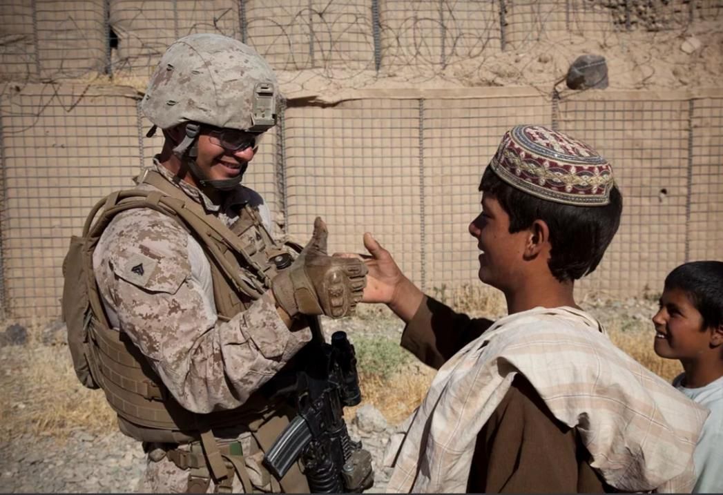 American soldier and Afghan Army engaged in a hand to hand combat, 2011