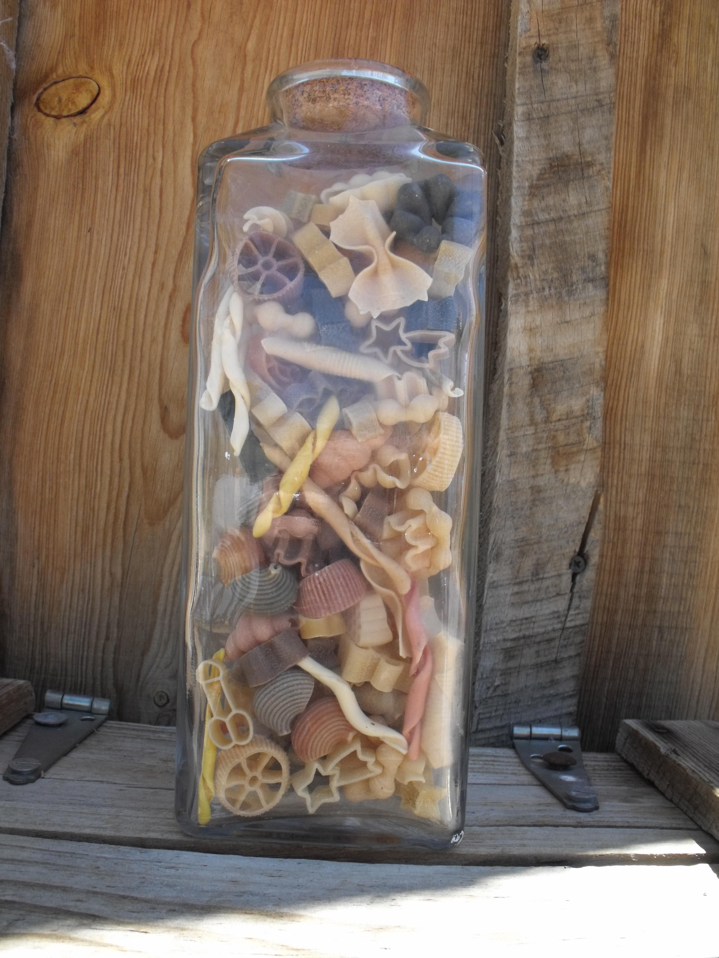 My mother brought back some pasta from Italy. Bears, wheels, shells, trees, twists, stars, bows, honeycomb, flowers ..... and ..... and ... WTH is THAT?