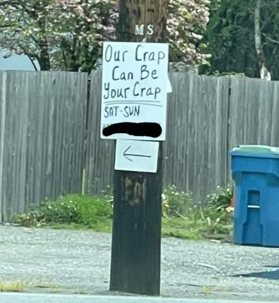 A local sign for a garage sale