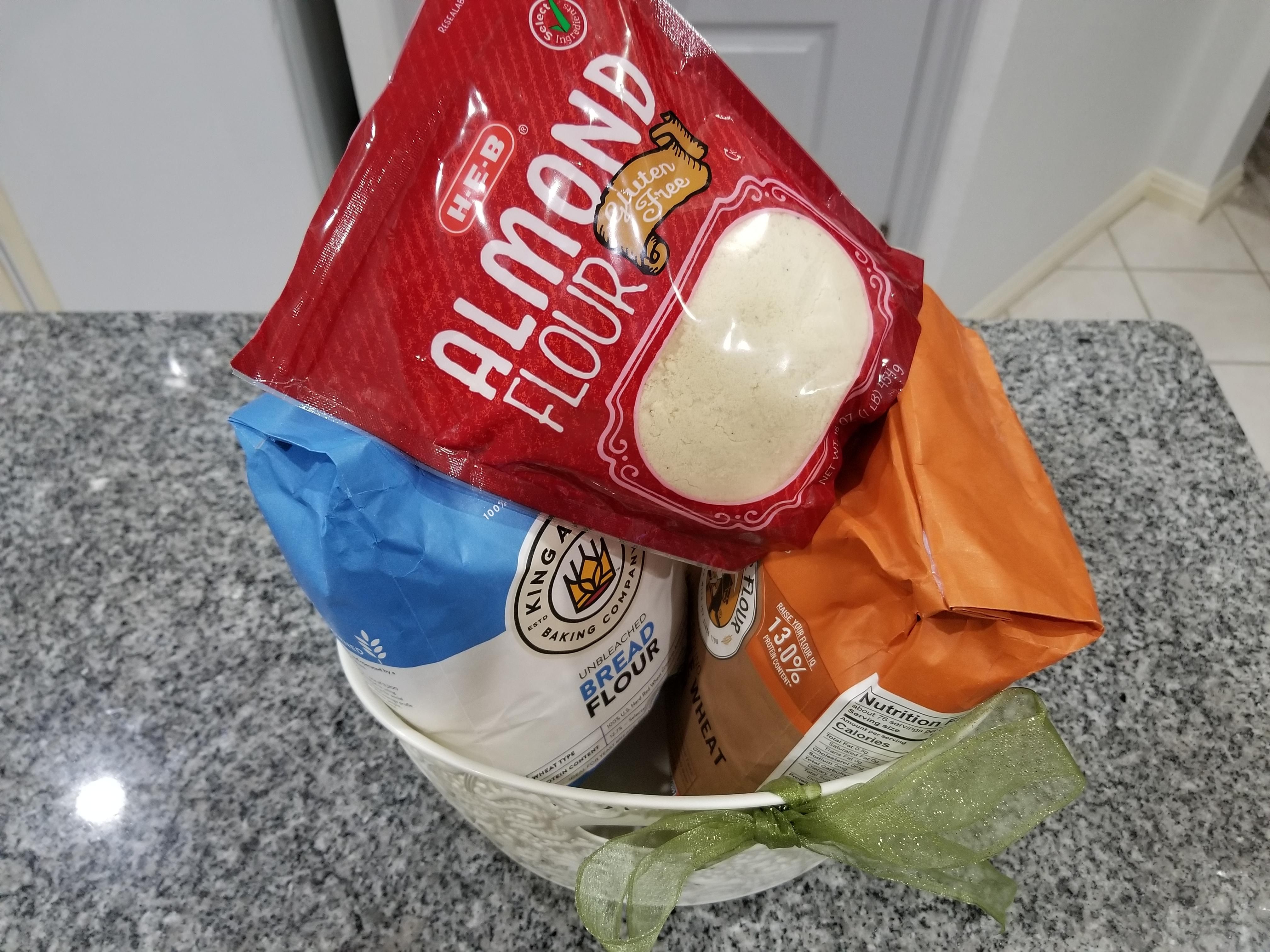 I am picking my wife up at the airport after a long trip, and a good friend said to bring her some nice flours as a surprise. I am bringing her a basket FULL of her favorite flours.