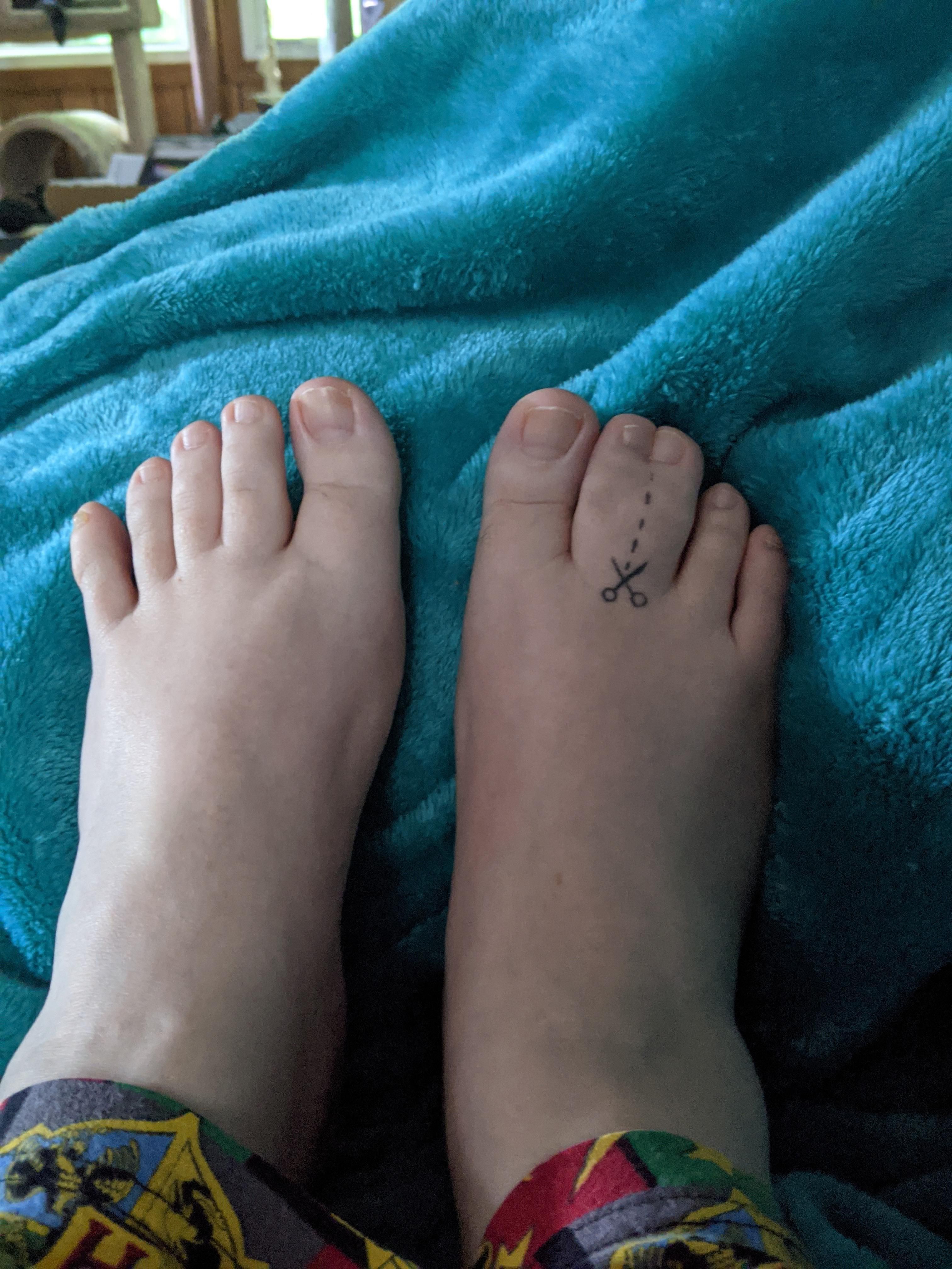 I was told this would fit well here. Behold my webbed toe tattoo!
