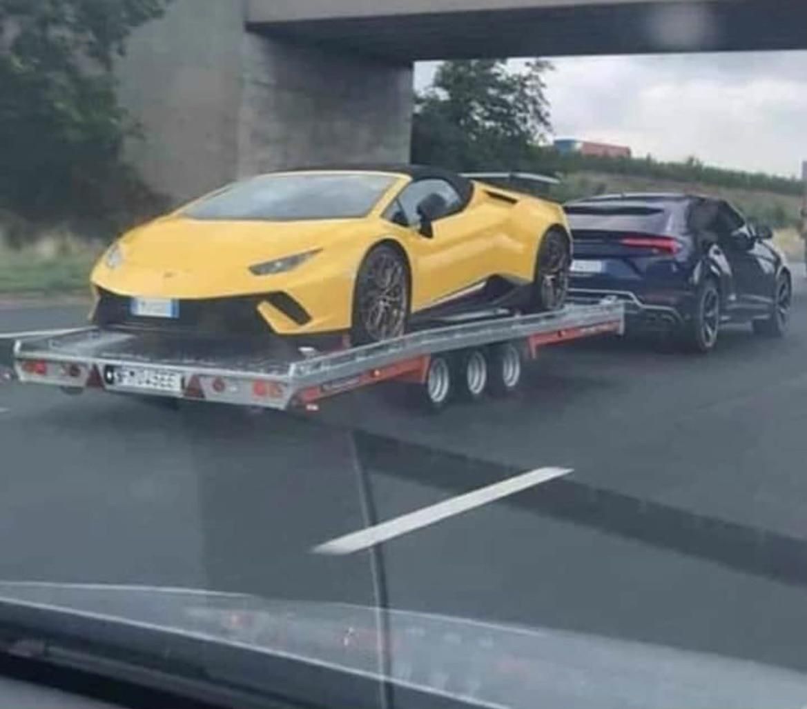 While I’m thinking how to be financially stable there is this guy towing a Lamborghini with a Lamborghini
